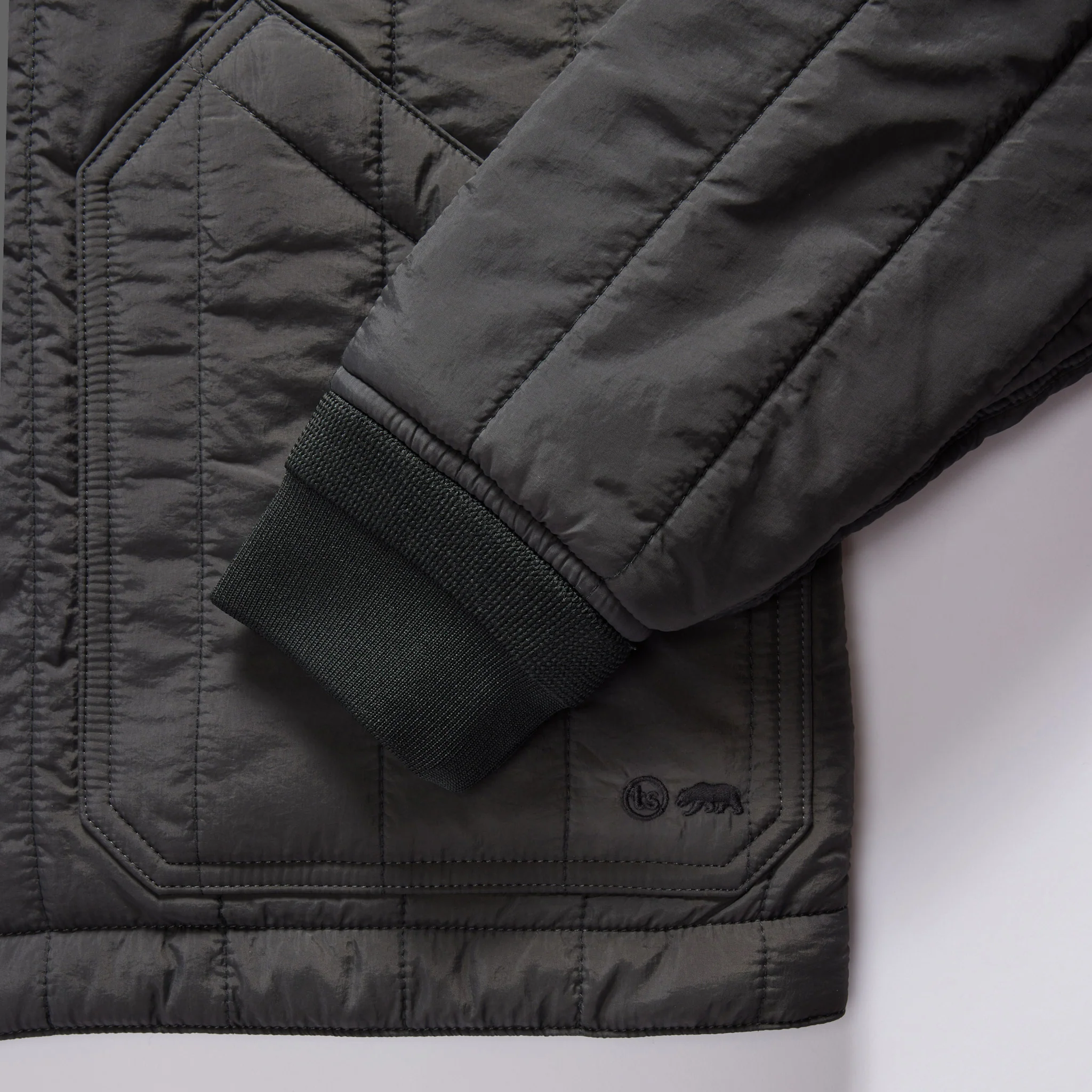 The Able Jacket in Faded Black Quilted Nylon - Image 7